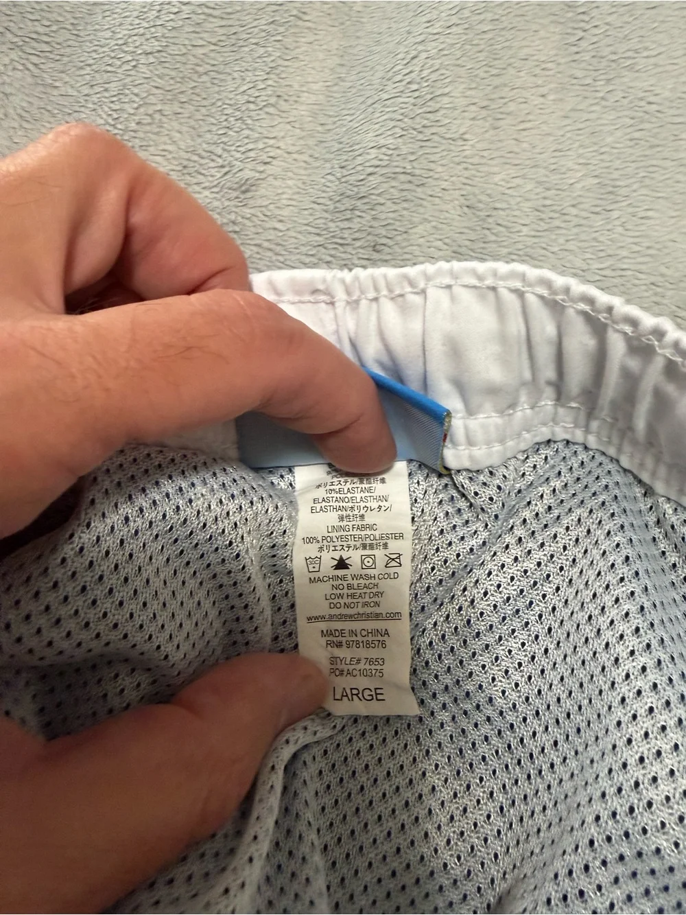 Andrew Christian lined swim trunks. They are a men’s large.